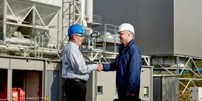 Endress+Hauser sales engineer with the manager of a power plant