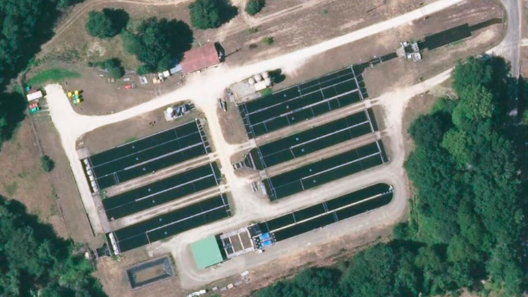 Aerial view of an open circuit fish farm with  recirculating water