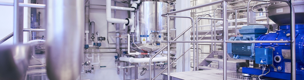 biopharmaceutical manufacturing plant with biopharmaceutical processing